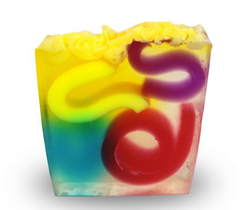Square smooth glycerin soap bar, clear background with yellow, blue, red and purple swirls. Jasmine scent. 
