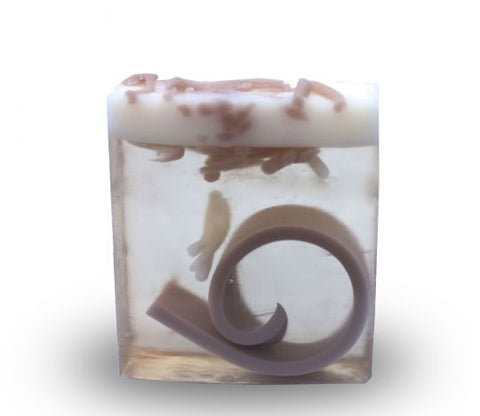 Square smooth glycerin soap bar, clear background with grey and white swirls. Coconut  scent. 