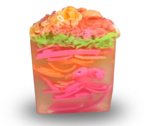Square smooth glycerin soap bar, clear background with bright green, pink and orange swirls. Cucumber Melon scent. 