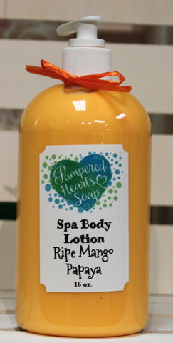 Clear 16 ounce bottle with white pump at the top and orange ribbon. Contains Ripe Mango Papaya scented body lotion. Label is white with Pampered Hearts Soap label and product description.