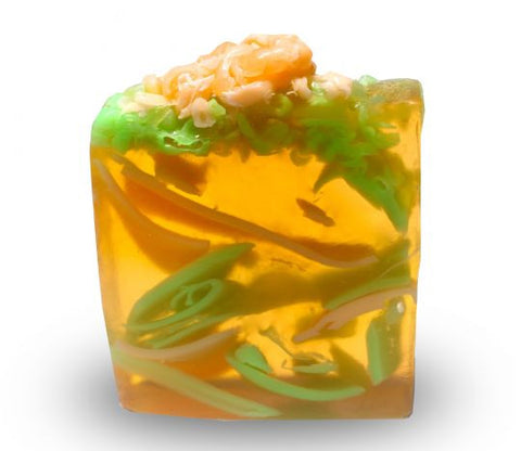 Square smooth glycerin soap bar, orange background with green and pale orange swirls. Sweet peach scent. 