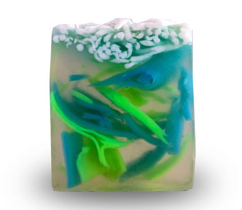 Square smooth glycerin soap bar, clear background with bright green and blue  swirls. Mint and rosemary scent. 