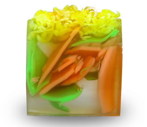 Square smooth glycerin soap bar, clear background with green, yellow and orange swirls. Bright tropical scent. 