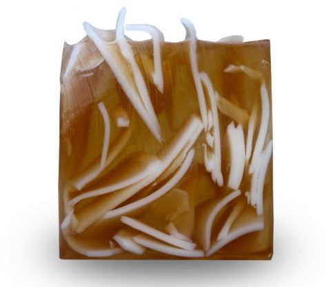 Square smooth glycerin soap bar, light brown background with white swirls. True vanilla scent. 